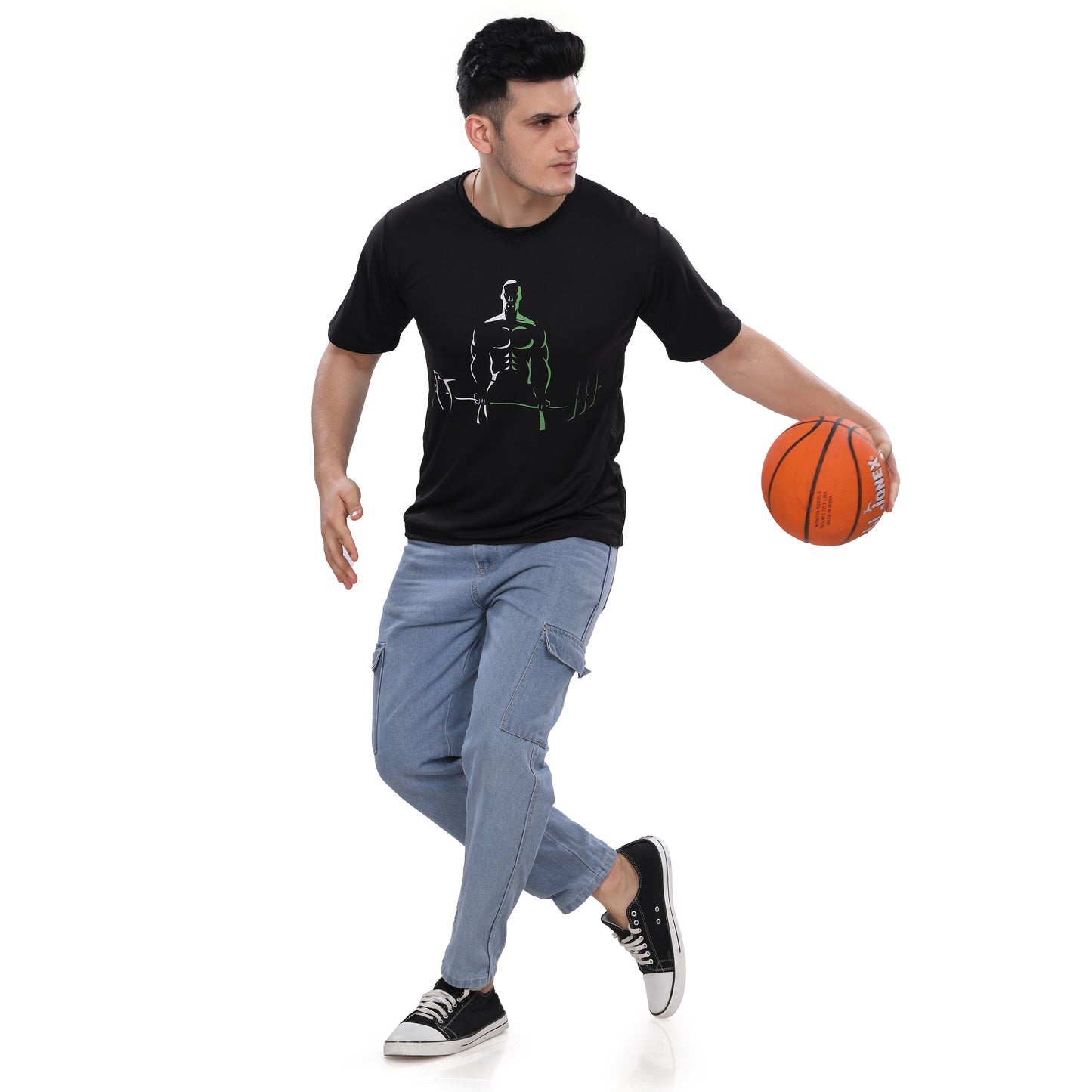 A man wearing a NutraStore supplement brand black t-shirt with a graphic print in the center, running and holding a basketball.