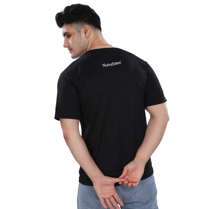 A man wearing a NutraStore supplement brand black t-shirt with a graphic print in the center, running and holding a basketball.